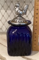 Cobalt blue glass jar with rooster lid