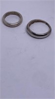 Pair of marked Sterling rings sizes 2.5 and 5.5