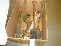Box of old ironware pieces.