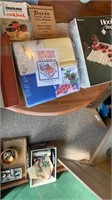 Cookbooks, Hook-it Rug Kit, and Quilting Squares