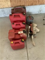 6 gas cans & cyclone seeder