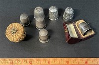 CHARMING LOT OF STERLING THIMBLES IN ANTIQUE CASES
