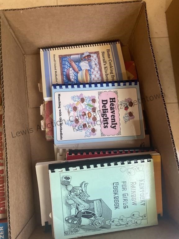 A box of cooking books and a box of glad storage