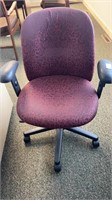 Upholstered Office Chair, swivels on wheels,