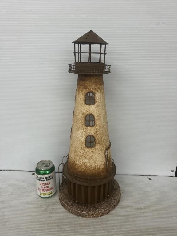 Decorative lighthouse with candle holder