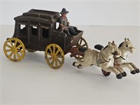 VTG CAST IRON COWBOY AND WAGON PULLED BY HORSES