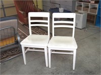 (2) Chairs - White in Color - Located in GARAGE