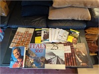 Collection of travel, cigar, and camera books