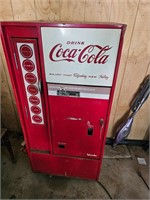 Antique 10-cent Coca-Cola bottle machine