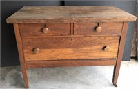 Vintage medium toned wood side table. Medium