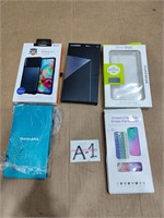 LOT OF 5 ASSORTED MOBILE CASES SELLING AS IS