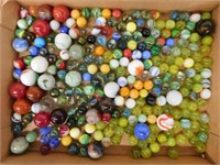 Flat of glass marbles including 27 shooters