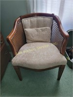 Chair with upholstered seat and back, cane sides,