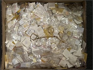 Watch repair parts and pieces, some labeled Timex