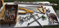 Hand saw, level, tools