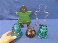 3 glass insulators -large cookie cutter -wooden