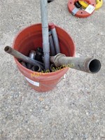 bucket of pipe fittings