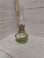 Small greenish oil lamp