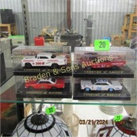 GROUP OF 4 NEW 1/64TH SCALE DIECAST CARS