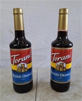 Two bottles of Torani Blood Orange syrup