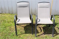 Two metal frame lawn chairs