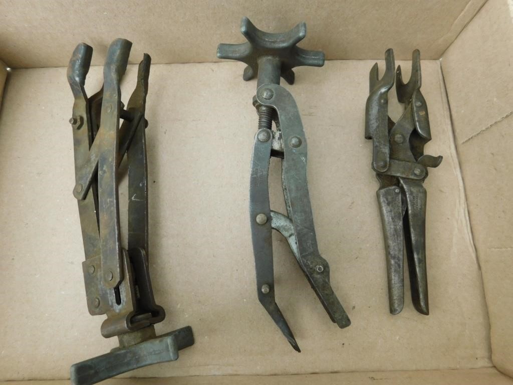Three vintage engine value wrenches.
