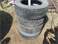 Four 215x65Rx16 tires