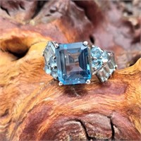 Sterling Silver & Blue Topaz Ring, Sz7.  Center