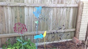 Bunny stakes, iron flower stake and garden fence