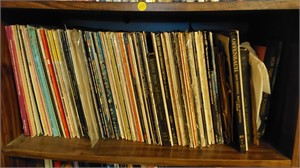 Albums on middle shelf