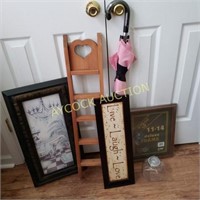 Decorative pictures, small shelf, umbrella,