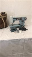 Dress maker swaying machine with peddle and cords