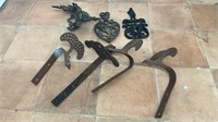 (2) iron trivets (1) lamp or candle holder (4)