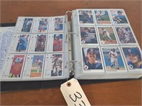 Binder of Upper Deck 1990 baseball cards