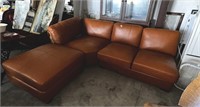 ORANGE LEATHER COUCH WITH OTTOMAN