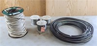A roll of non metallic sheathed cable, 3 rolls of