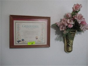 Grandfather award and fans on wall