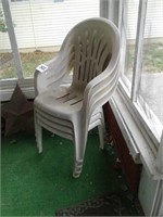 4 plastic stacking chairs