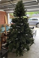 Artificial Christmas tree 7.5’ pre lit- some light
