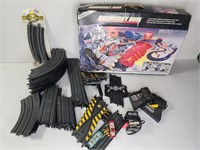 Two vintage slot car tracks, Tyco Doomsday Duel