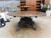 ROUND HEAVY CARVED OAK COFFEE TABLE