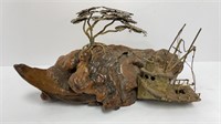 Mid-century brutalist sculpture with bonsai tree