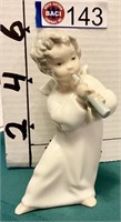 LLADRO "ANGEL BLOWING HORN"