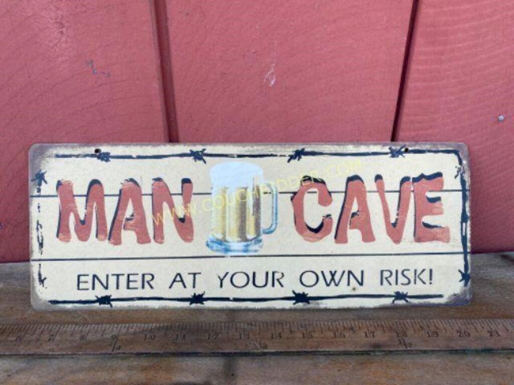 Metal Man Cave Sign