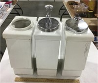 Ceramic dispensers -one has chip on top see photo
