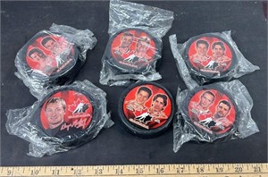 6 Team Canada Collector Hockey Pucks.
