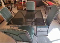 E - GLASS-TOP TABLE W/ 4 CHAIRS