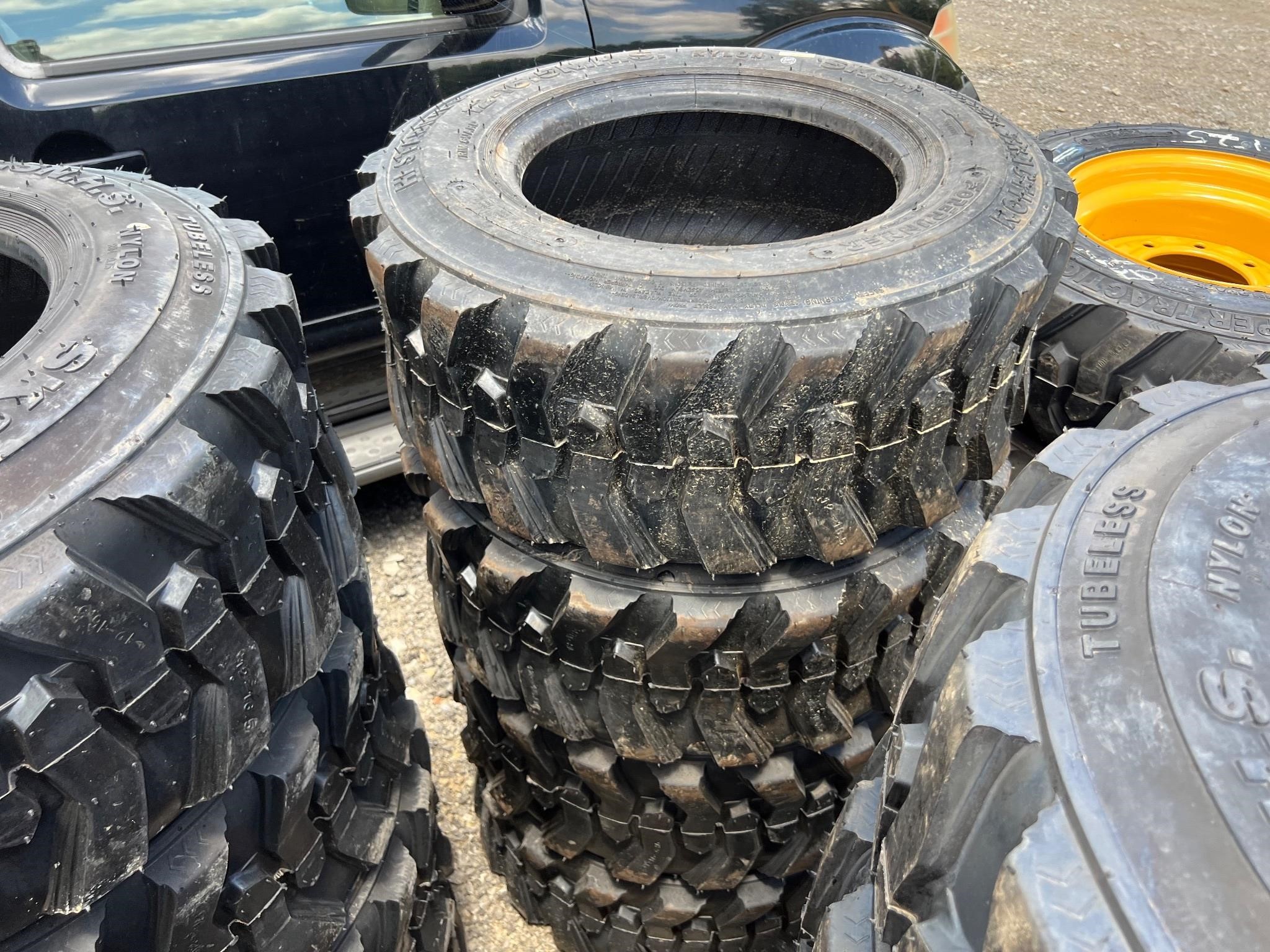 4 Unused 12-16.5 Skid Steer Tires