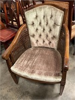 Upholstery barrel chair w cane sides