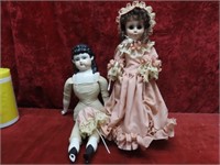 (2)Vintage dolls.